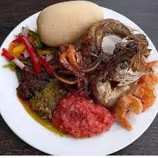 Banku with pepper and fried fish