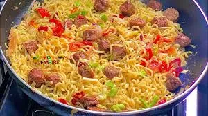 Indomie with sausage, gizzard, Saadi,can-beef