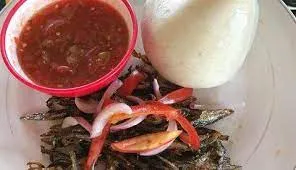 Kokonte and groundnut soup, cowmeat, beef, wele and intestine