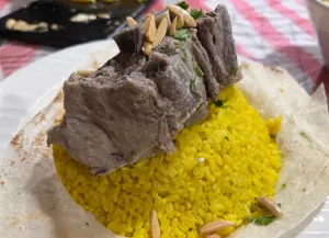 Lamb Mansaf With Rice And Jamed Sauce                                                                                      منسف لحم مع أرز و صوص جاميد