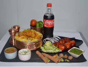 Chicken Biryani With Kabab added Soft Drinks
