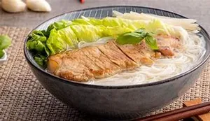 Rice Noodles With Grilled Pork Chop Soup