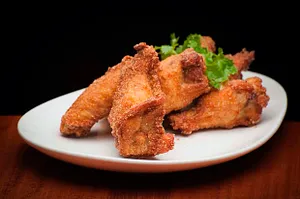 VIETNAMESE CHICKEN WINGS WITH CRISPY GARLIC.