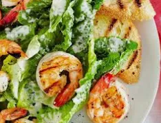 Grilled Shrimp over Caesar Salad