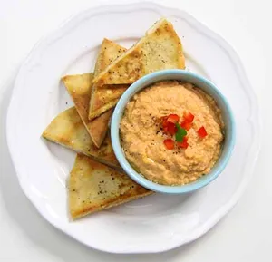 Zesty Parsly potato chips and Hummus dip