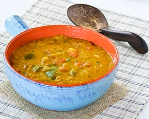 Dhal,Tomato chutney, Aloo baigan, Raita with Rice or Roti