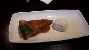 Warm Toffee Apple Crumble Tart With Vanilla Ice Cream