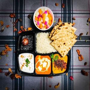 Dal Lasooni and Paneer Makhani Thali