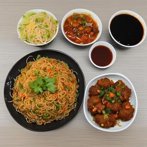 Veg Noodles with Veg Manchurian and Coke Soft Beverage [250 ml]