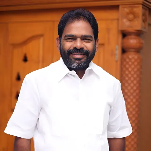 Babu M