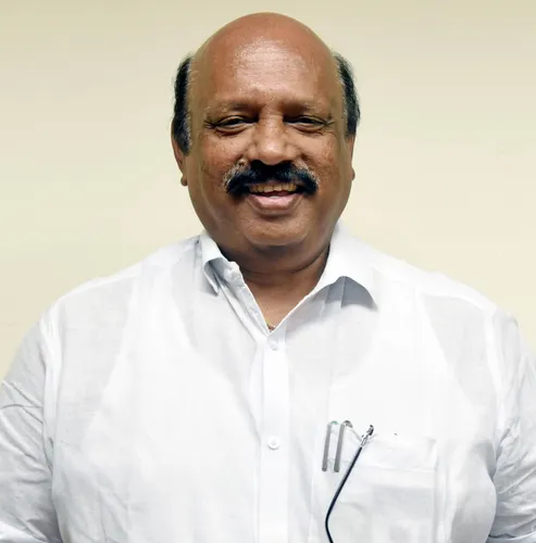 Thomas K Thomas