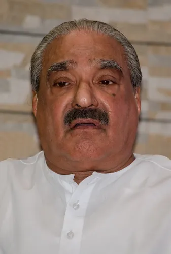 K M Mani